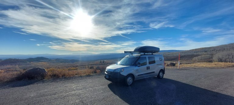 Campervan parked at a paved campsite while camping near Red Rock Canyon outside Las Vegas